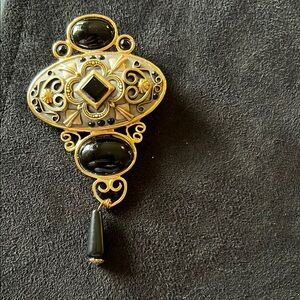 Michal Golan Elegant Black and Gold Brooch